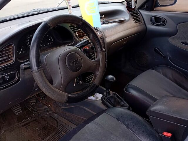 Черный Дэу Сенс, объемом двигателя 1.3 л и пробегом 374 тыс. км за 1300 $, фото 2 на Automoto.ua