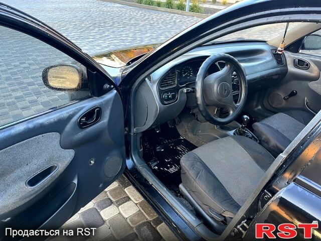 Черный Дэу Сенс, объемом двигателя 1.3 л и пробегом 140 тыс. км за 1100 $, фото 5 на Automoto.ua