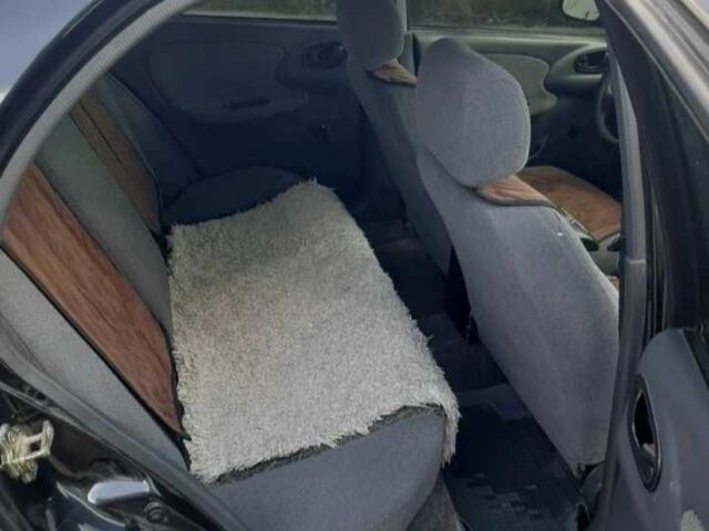 Чорний Деу Сенс, об'ємом двигуна 1.3 л та пробігом 188 тис. км за 2000 $, фото 6 на Automoto.ua