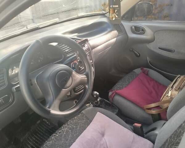 Черный Дэу Сенс, объемом двигателя 1.3 л и пробегом 286 тыс. км за 3000 $, фото 2 на Automoto.ua