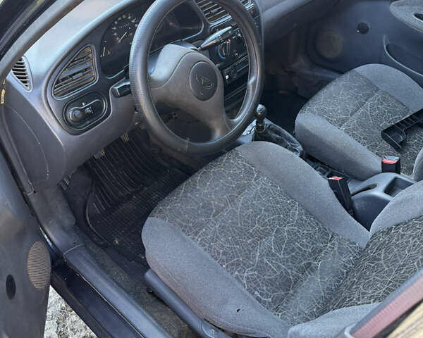 Черный Дэу Сенс, объемом двигателя 1.3 л и пробегом 178 тыс. км за 1550 $, фото 4 на Automoto.ua