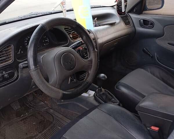 Черный Дэу Сенс, объемом двигателя 1.3 л и пробегом 317 тыс. км за 1100 $, фото 5 на Automoto.ua