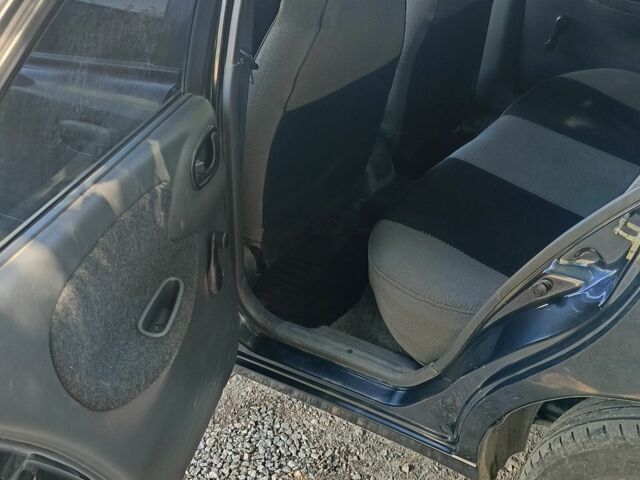 Черный Дэу Сенс, объемом двигателя 1.3 л и пробегом 386 тыс. км за 1700 $, фото 6 на Automoto.ua