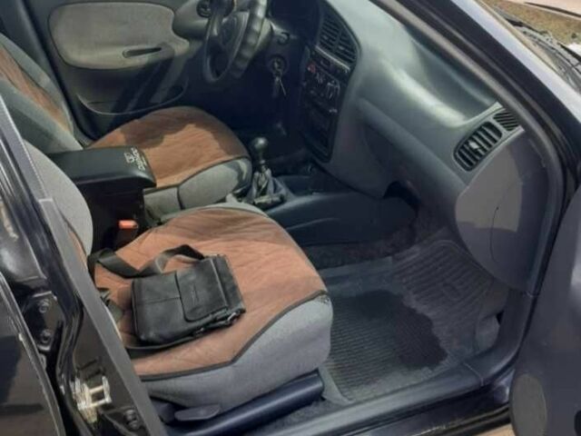 Чорний Деу Сенс, об'ємом двигуна 1.3 л та пробігом 188 тис. км за 2000 $, фото 5 на Automoto.ua