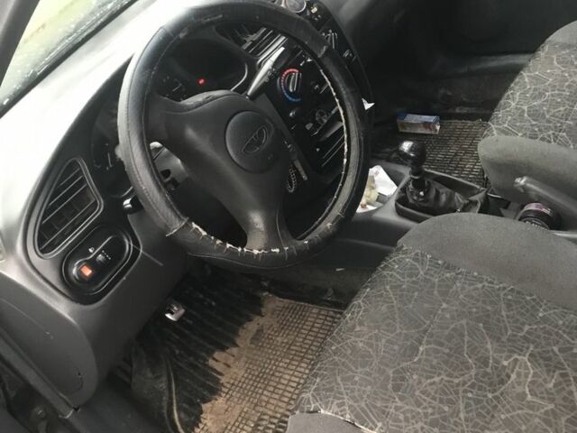 Чорний Деу Сенс, об'ємом двигуна 1.3 л та пробігом 200 тис. км за 2050 $, фото 1 на Automoto.ua