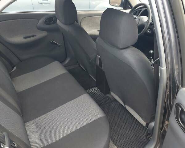 Черный Дэу Сенс, объемом двигателя 1.3 л и пробегом 188 тыс. км за 1600 $, фото 4 на Automoto.ua