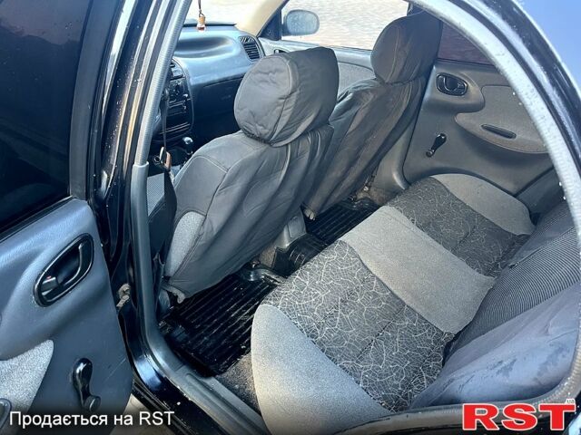 Черный Дэу Сенс, объемом двигателя 1.3 л и пробегом 140 тыс. км за 1100 $, фото 6 на Automoto.ua