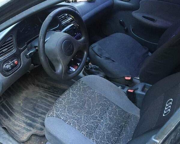 Чорний Деу Сенс, об'ємом двигуна 1.3 л та пробігом 296 тис. км за 998 $, фото 5 на Automoto.ua