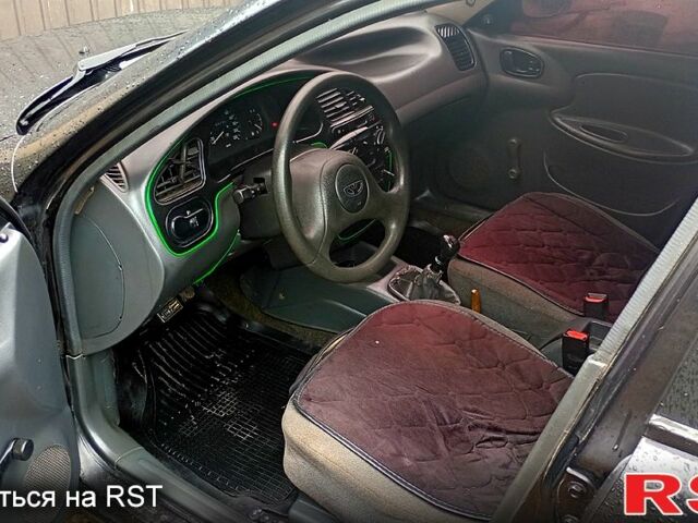 Чорний Деу Сенс, об'ємом двигуна 1.3 л та пробігом 220 тис. км за 1999 $, фото 4 на Automoto.ua