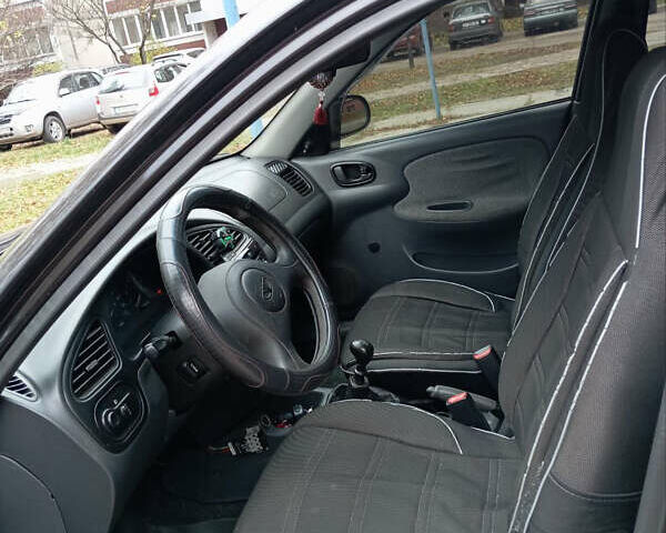 Чорний Деу Сенс, об'ємом двигуна 1.3 л та пробігом 220 тис. км за 1150 $, фото 3 на Automoto.ua