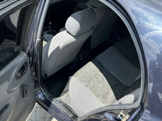 Черный Дэу Сенс, объемом двигателя 1.5 л и пробегом 102 тыс. км за 1550 $, фото 11 на Automoto.ua