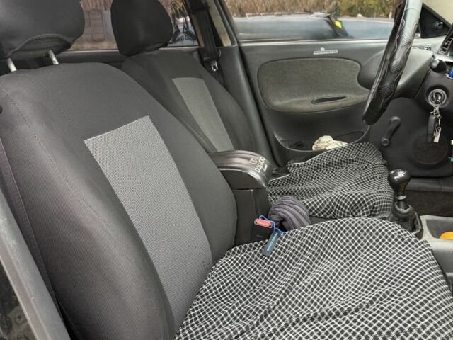 Чорний Деу Сенс, об'ємом двигуна 1.4 л та пробігом 250 тис. км за 1099 $, фото 6 на Automoto.ua