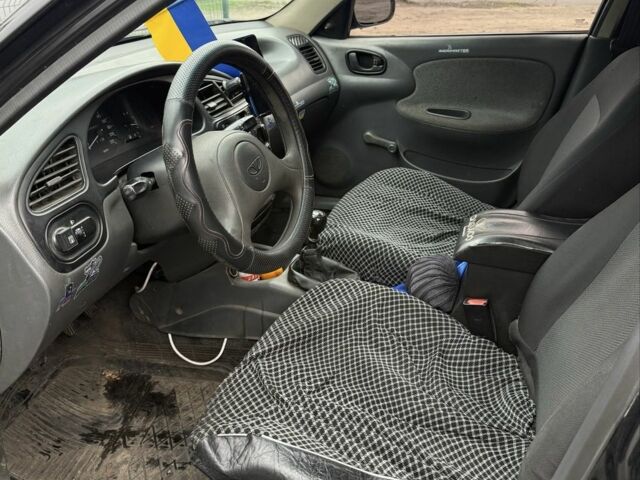 Чорний Деу Сенс, об'ємом двигуна 1.4 л та пробігом 250 тис. км за 1099 $, фото 5 на Automoto.ua