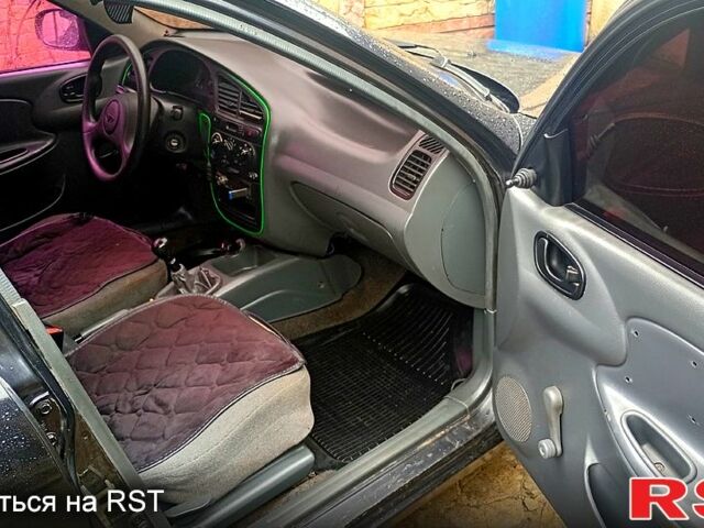 Чорний Деу Сенс, об'ємом двигуна 1.3 л та пробігом 220 тис. км за 1999 $, фото 6 на Automoto.ua