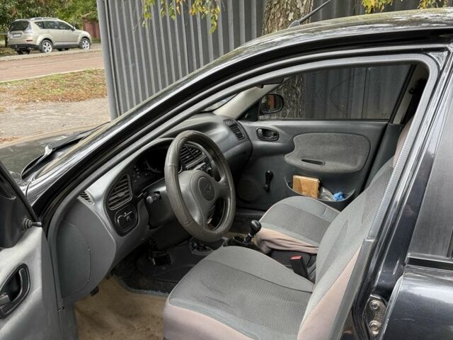 Черный Дэу Сенс, объемом двигателя 1.3 л и пробегом 197 тыс. км за 1900 $, фото 5 на Automoto.ua