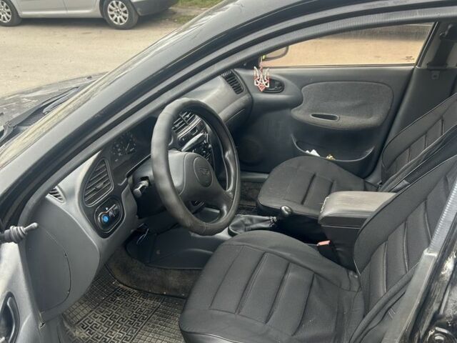 Черный Дэу Сенс, объемом двигателя 1.5 л и пробегом 225 тыс. км за 1200 $, фото 6 на Automoto.ua