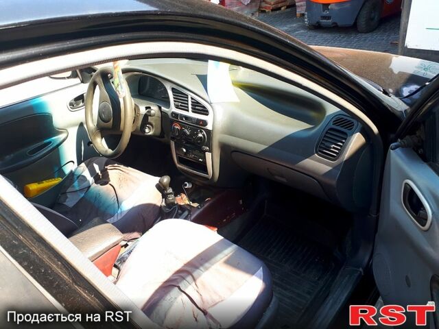 Черный Дэу Сенс, объемом двигателя 1.3 л и пробегом 354 тыс. км за 2300 $, фото 2 на Automoto.ua