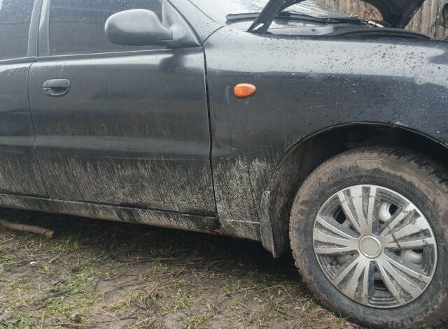 Черный Дэу Сенс, объемом двигателя 1.3 л и пробегом 277 тыс. км за 1800 $, фото 1 на Automoto.ua