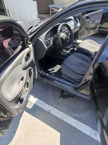 Чорний Деу Сенс, об'ємом двигуна 1.3 л та пробігом 135 тис. км за 1100 $, фото 14 на Automoto.ua