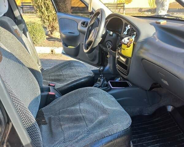 Чорний Деу Сенс, об'ємом двигуна 1.3 л та пробігом 126 тис. км за 3200 $, фото 3 на Automoto.ua
