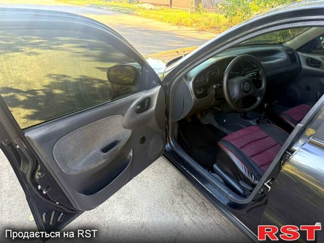 Черный Дэу Сенс, объемом двигателя 1.3 л и пробегом 268 тыс. км за 1550 $, фото 5 на Automoto.ua