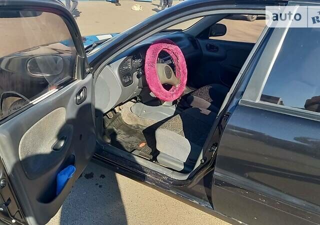 Черный Дэу Сенс, объемом двигателя 1.3 л и пробегом 170 тыс. км за 1500 $, фото 5 на Automoto.ua