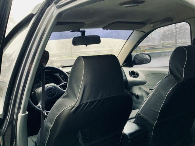 Черный Дэу Сенс, объемом двигателя 1.5 л и пробегом 200 тыс. км за 1514 $, фото 6 на Automoto.ua