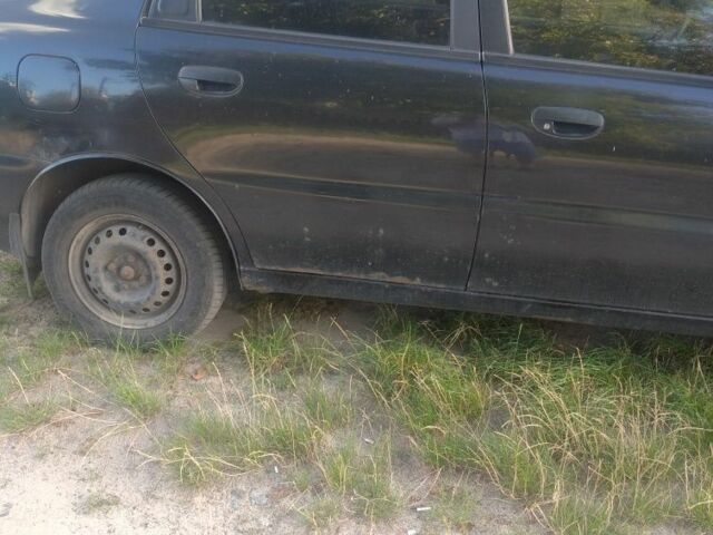 Черный Дэу Сенс, объемом двигателя 1.4 л и пробегом 280 тыс. км за 953 $, фото 2 на Automoto.ua