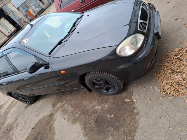 Чорний Деу Сенс, об'ємом двигуна 1.5 л та пробігом 230 тис. км за 2000 $, фото 6 на Automoto.ua