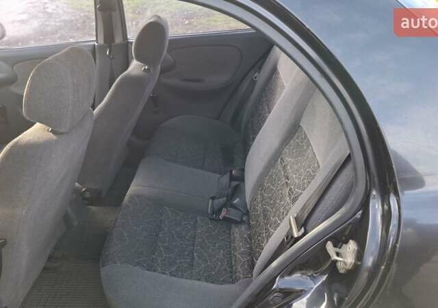 Черный Дэу Сенс, объемом двигателя 1.3 л и пробегом 454 тыс. км за 900 $, фото 4 на Automoto.ua