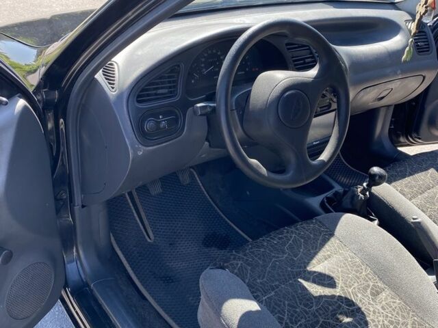 Черный Дэу Сенс, объемом двигателя 1.5 л и пробегом 226 тыс. км за 2300 $, фото 6 на Automoto.ua