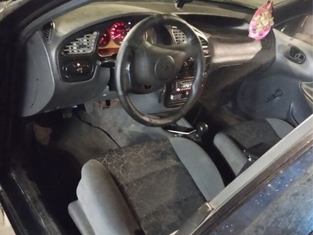 Черный Дэу Сенс, объемом двигателя 1.3 л и пробегом 230 тыс. км за 799 $, фото 4 на Automoto.ua