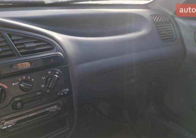 Черный Дэу Сенс, объемом двигателя 1.3 л и пробегом 454 тыс. км за 900 $, фото 2 на Automoto.ua