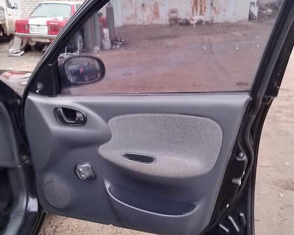 Черный Дэу Сенс, объемом двигателя 1.3 л и пробегом 238 тыс. км за 1800 $, фото 2 на Automoto.ua