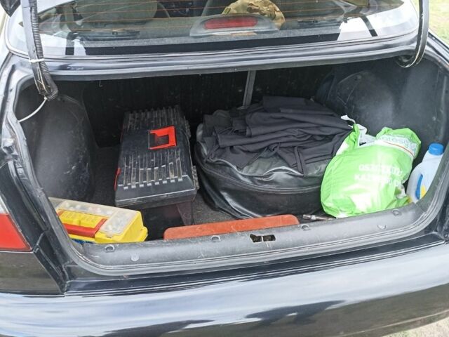 Черный Дэу Сенс, объемом двигателя 1.5 л и пробегом 220 тыс. км за 1800 $, фото 6 на Automoto.ua