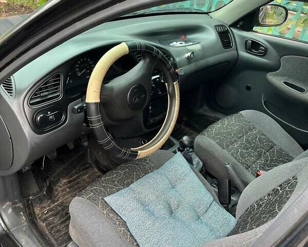 Черный Дэу Сенс, объемом двигателя 1.3 л и пробегом 240 тыс. км за 1600 $, фото 4 на Automoto.ua