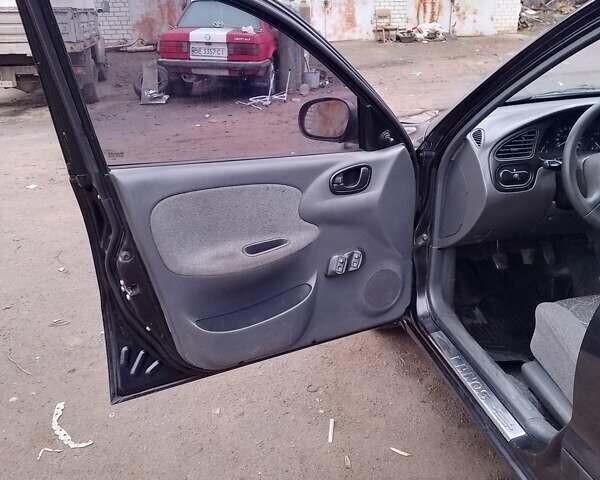 Черный Дэу Сенс, объемом двигателя 1.3 л и пробегом 238 тыс. км за 1800 $, фото 12 на Automoto.ua