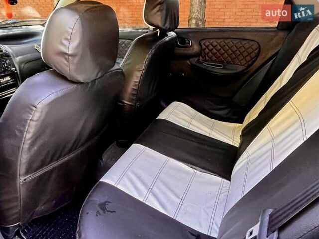 Чорний Деу Сенс, об'ємом двигуна 1.3 л та пробігом 225 тис. км за 1400 $, фото 7 на Automoto.ua
