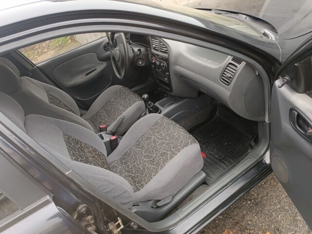 Черный Дэу Сенс, объемом двигателя 1.5 л и пробегом 198 тыс. км за 2200 $, фото 3 на Automoto.ua