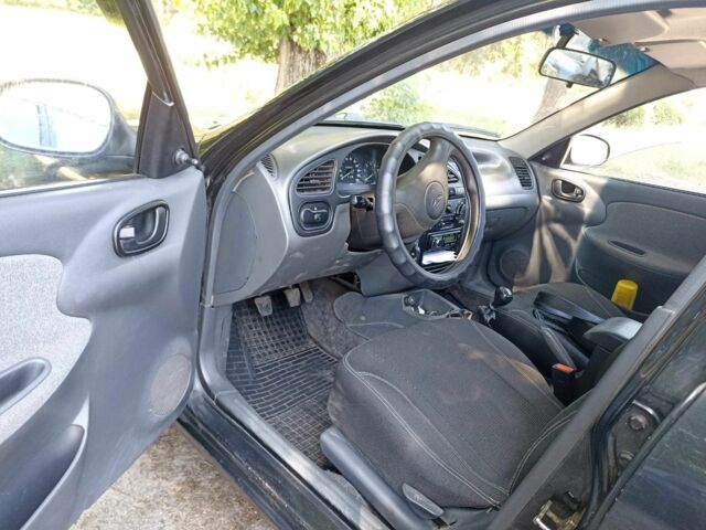 Черный Дэу Сенс, объемом двигателя 1.5 л и пробегом 160 тыс. км за 2600 $, фото 4 на Automoto.ua