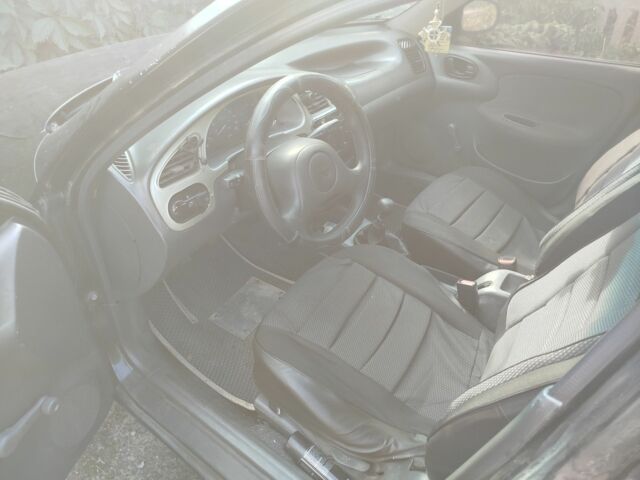 Черный Дэу Сенс, объемом двигателя 1.5 л и пробегом 300 тыс. км за 1800 $, фото 4 на Automoto.ua