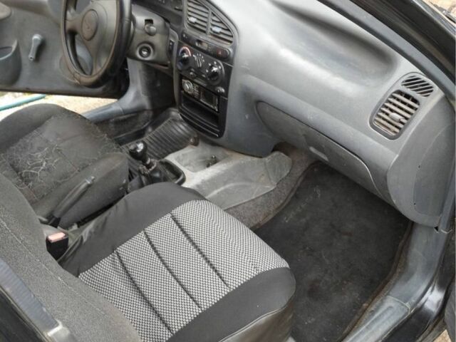 Черный Дэу Сенс, объемом двигателя 1.4 л и пробегом 1 тыс. км за 2000 $, фото 1 на Automoto.ua