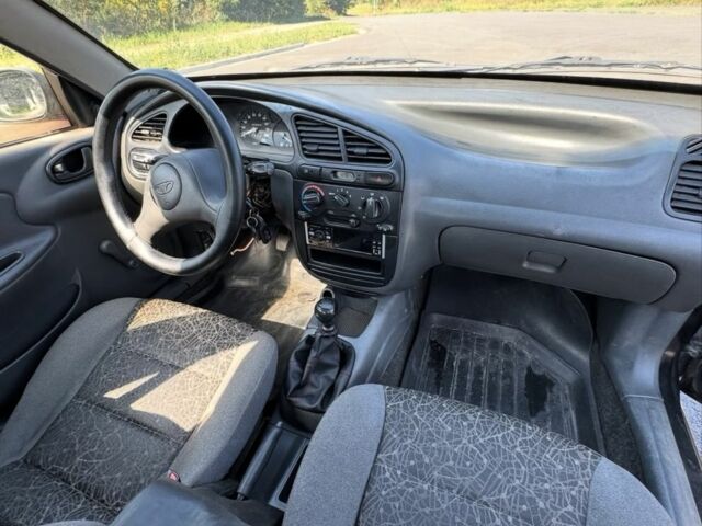 Черный Дэу Сенс, объемом двигателя 1.4 л и пробегом 285 тыс. км за 1350 $, фото 9 на Automoto.ua