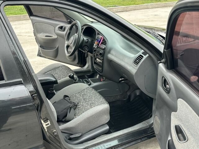 Черный Дэу Сенс, объемом двигателя 1.5 л и пробегом 260 тыс. км за 2400 $, фото 6 на Automoto.ua