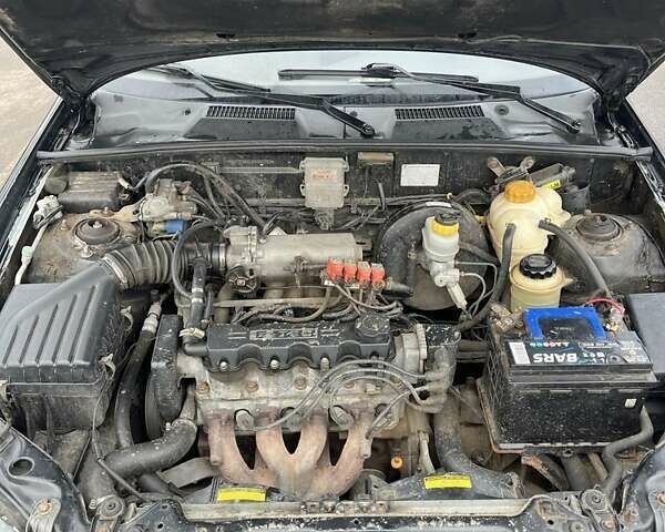 Чорний Деу Сенс, об'ємом двигуна 1.5 л та пробігом 200 тис. км за 1657 $, фото 5 на Automoto.ua