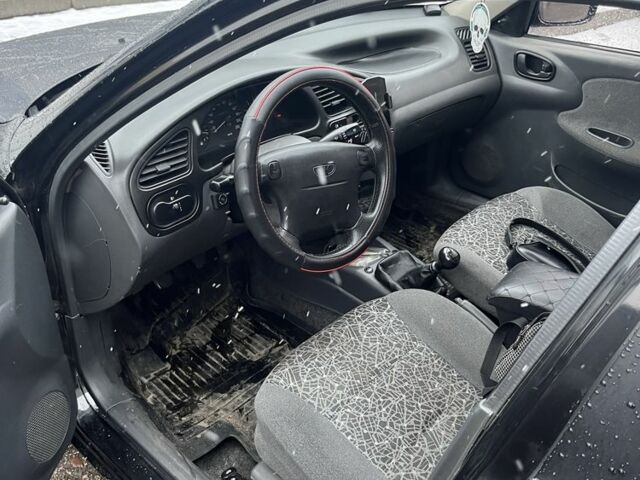 Черный Дэу Сенс, объемом двигателя 1.5 л и пробегом 230 тыс. км за 2300 $, фото 5 на Automoto.ua