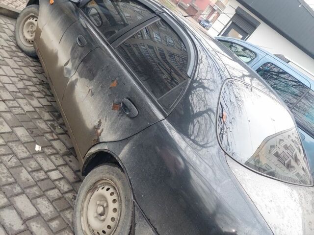 Черный Дэу Сенс, объемом двигателя 1.4 л и пробегом 320 тыс. км за 1500 $, фото 2 на Automoto.ua