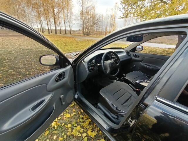 Чорний Деу Сенс, об'ємом двигуна 1.4 л та пробігом 217 тис. км за 2100 $, фото 6 на Automoto.ua