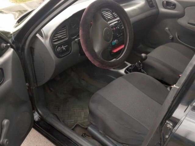 Чорний Деу Сенс, об'ємом двигуна 1.5 л та пробігом 230 тис. км за 2000 $, фото 5 на Automoto.ua