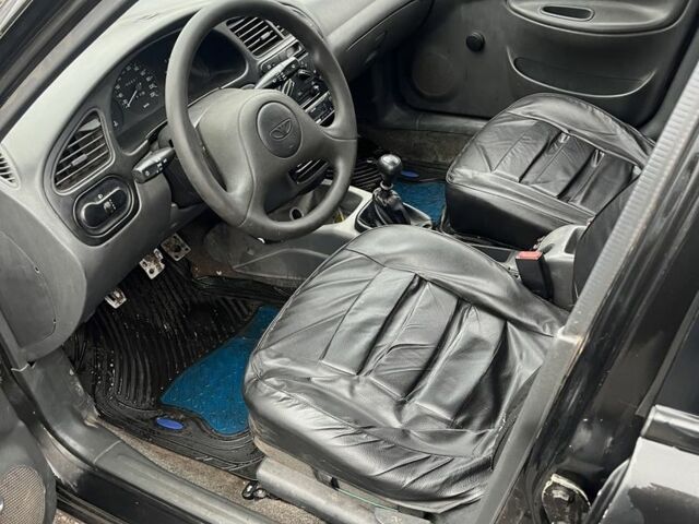 Чорний Деу Сенс, об'ємом двигуна 1.4 л та пробігом 202 тис. км за 1000 $, фото 5 на Automoto.ua